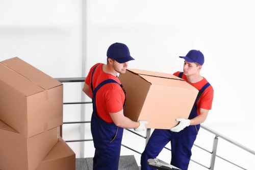 Professional movers assisting with a move in Brent