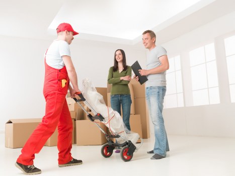 Professional movers assisting with a home relocation in Brent